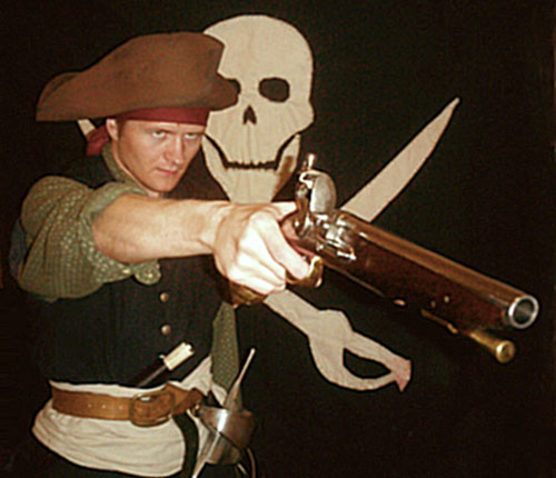 dane dressed up as a pirate, with a hat and gun and sword and everything!